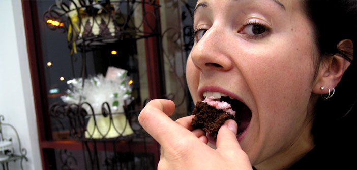 Photo credit: Alex Mestas (Creative Commons) - Young-woman-eating-chocolate-cake-by-Alex-Mestas-Creative-Commons