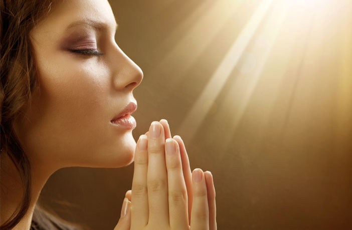 Prayer leads people who believe in a benevolent God to read less hostility  in others' eyes, study finds