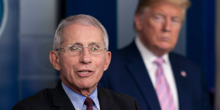 President Donald J. Trump listens as Dr. Anthony Fauci delivers remarks at a coronavirus update briefing. (Official White House Photo by Andrea Hanks.)