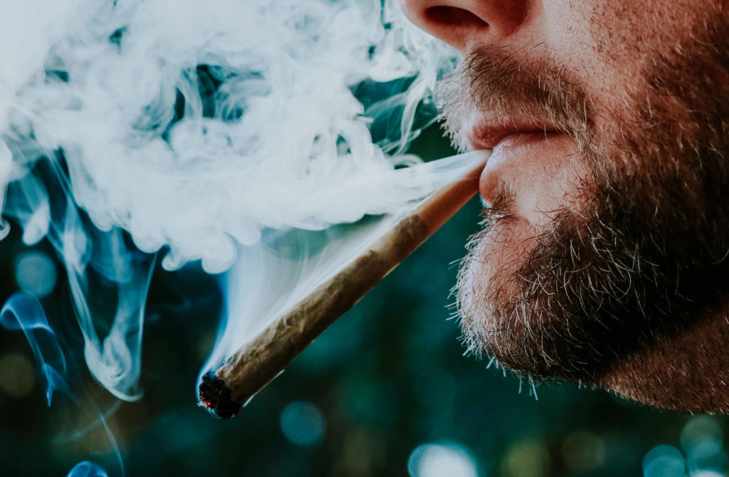 https://www.psypost.org/wp-content/uploads/2020/12/man-smoking-a-marijuana-cannabis-joint-1024x670.jpg