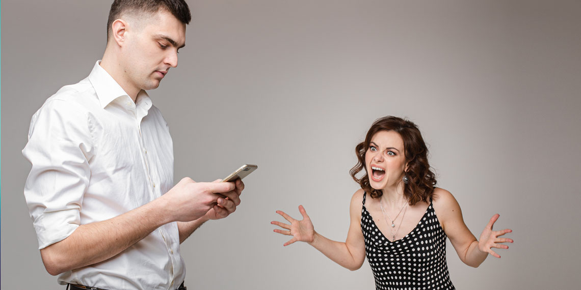 woman-shouting-at-her-boyfriend-while-he-is-using-his-mobile-phone-phubbing.jpg