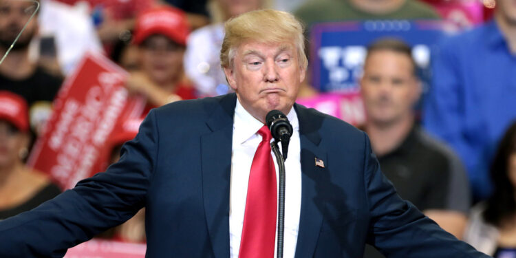 Donald Trump speaking with supporters at a campaign rally at the Phoenix Convention Center in 2016. (Photo credit: Gage Skidmore)