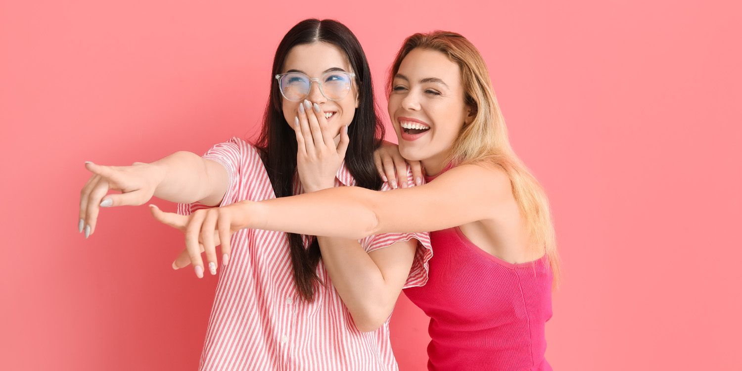 an opponent's suffering triggers a spontaneous smile